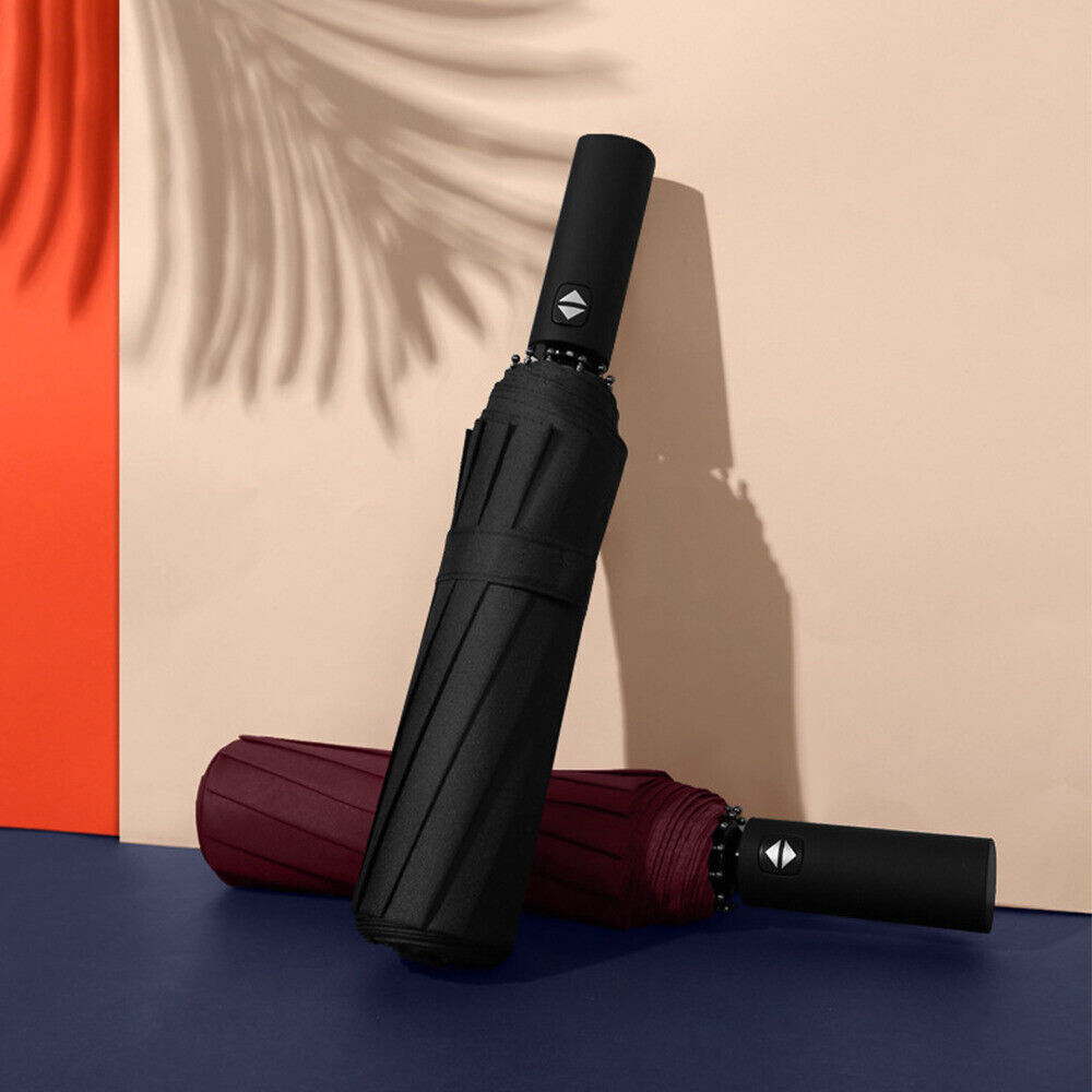Black and burgundy umbrellas on a colorful background