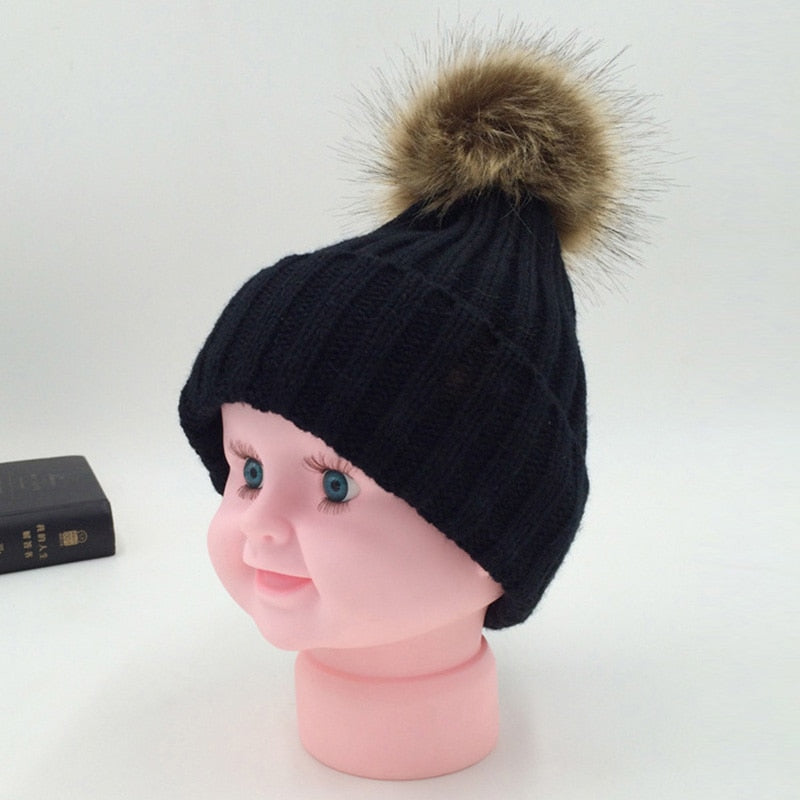 Pom hat in snow