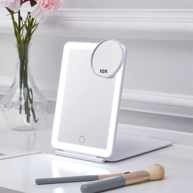 LED Touch Makeup Mirror with Light – Portable Folding Vanity Mirror (White, Pink, Black) – USB Rechargeable for convenient use in bedroom, business, or bathroom. Perfect for travel or daily makeup routines, providing clear, bright lighting. Ideal for on-the-go and compact storage. Enhance your beauty routine with this sleek, portable mirror. Available in multiple colors to match your style. Perfect for gifting or personal use. Everything Amazing shop for this product.