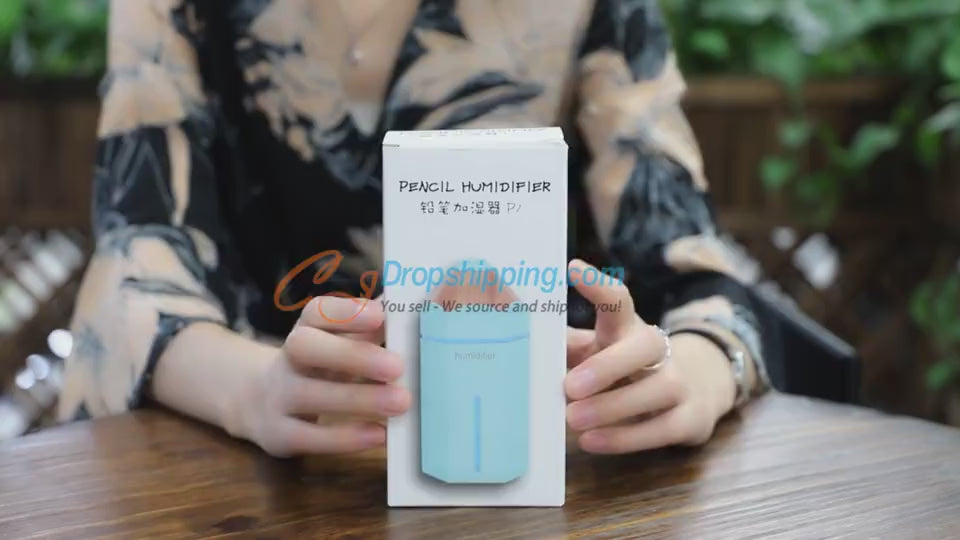 A colorful mini humidifier shaped like a pencil, available in yellow, pink, and blue, with a glowing LED light feature, designed for portable use in home or office settings.