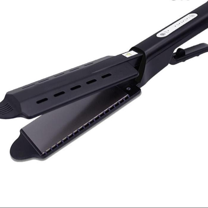 Tourmaline Ceramic Hair Straightener & Curling Iron, a versatile 2-in-1 hair styler that effortlessly transforms hair into sleek, smooth, or curly styles. Featuring advanced ceramic technology for even heat distribution and frizz-free results, this hair tool is perfect for all hair types, ensuring long-lasting shine and volume. Achieve your desired look with ease—whether you're styling straight or curly hair. Perfect for home or professional use. Available at Everything Amazing Shop for this product.