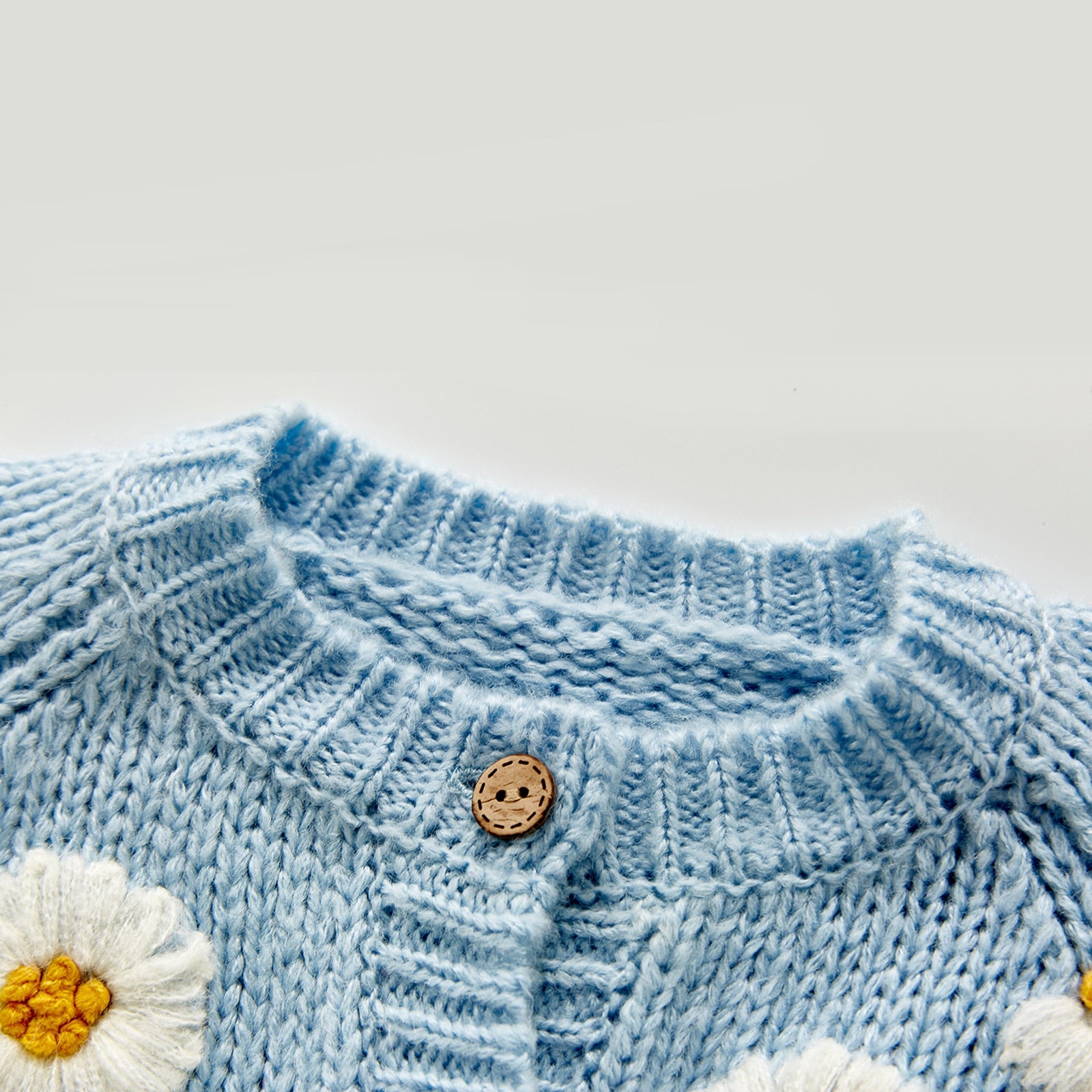 Baby girl sweater in vibrant rainbow colors
