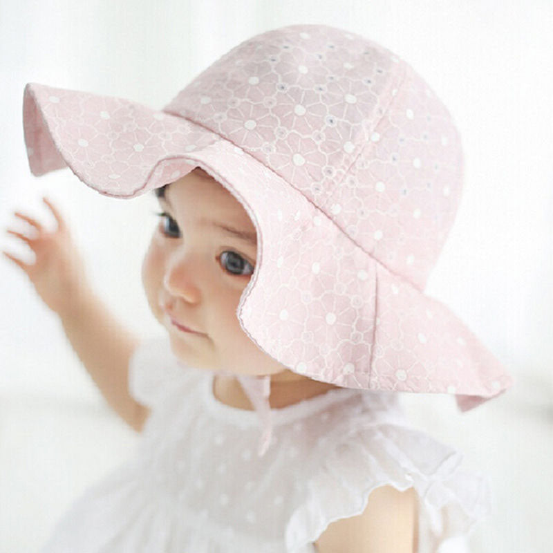 Pink baby sun hat with floral print