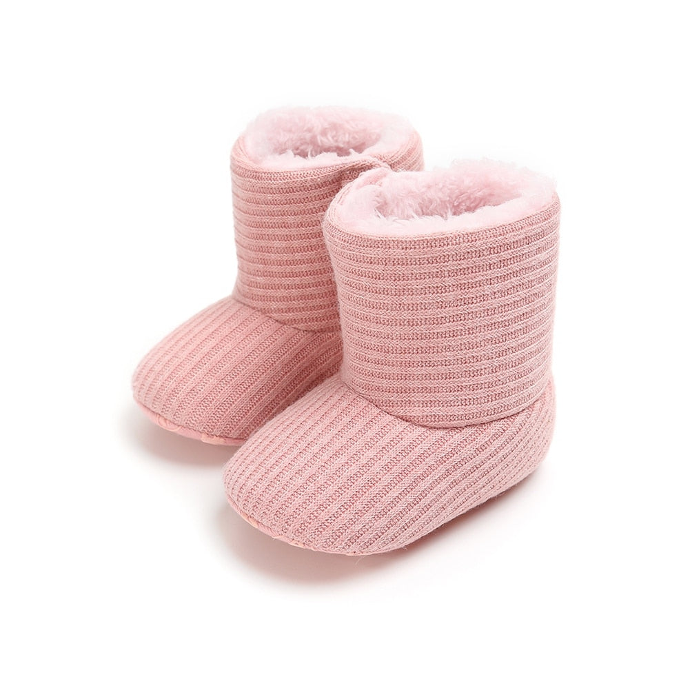 Baby wearing autumn boots
