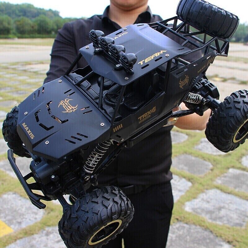 XL Large 4WD RC Monster Truck with durable metal shell, LED headlights, 2 rechargeable batteries, and off-road capabilities for all terrains, perfect for kids and adults.