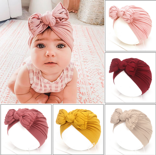 Cute baby hat featuring a soft and comfortable newborn turban design for baby girls. Stylish and cozy, this turban ensures a perfect fit for your little one while providing ultimate comfort. Ideal for daily wear and special occasions. Everything Amazing Shop.