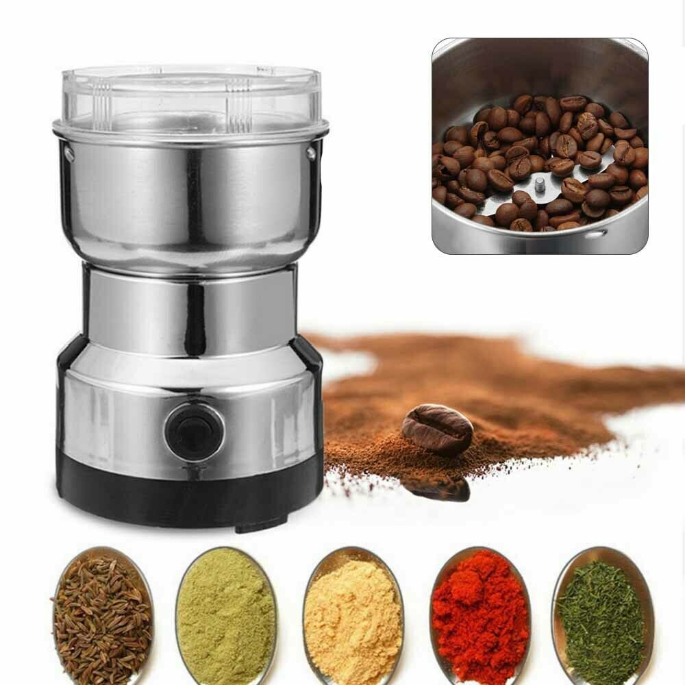 Coffee grinder with coffee beans and ground coffee powder on a white background