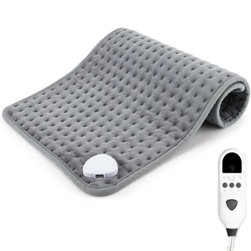 Gray heating pad with a digital controller on a white background