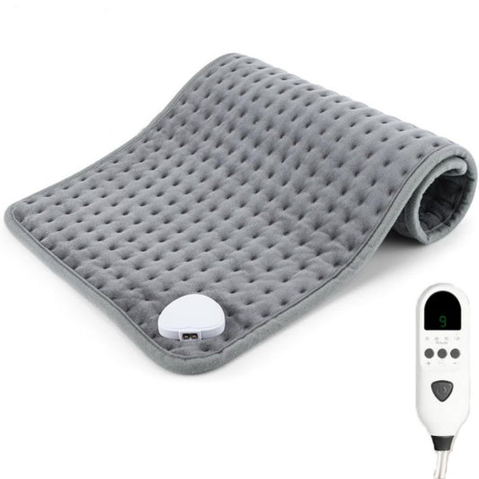 Gray heating pad with a digital controller on a white background
