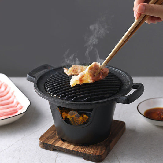 Mini portable smokeless BBQ grill with dual alcohol burners and non-stick surface for home and outdoor cooking

