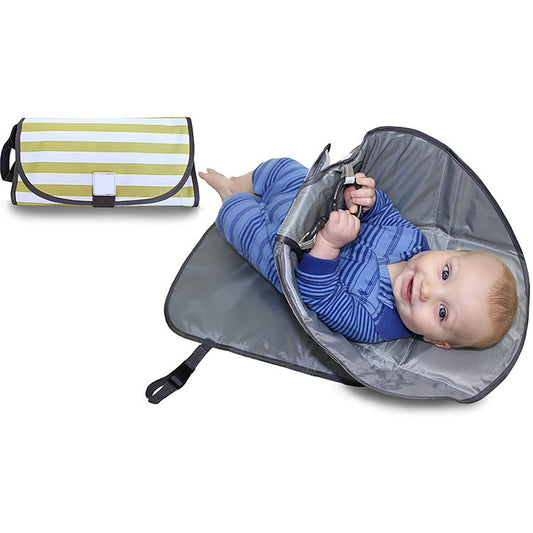 A stylish and functional portable diaper changing pad clutch, designed for parents on the go. Made from high-quality materials, this diaper clutch is perfect for keeping babies comfortable during diaper changes while out and about. Compact, easy to carry, and highly practical for busy parents. Find the best baby care essentials at Everything Amazing Shop for this product.