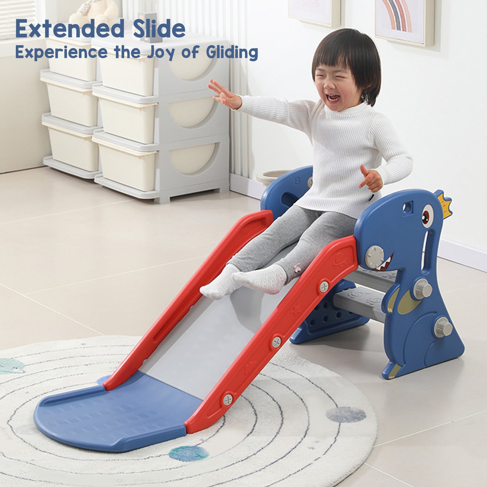 Child sliding down a colorful slide with text 'Extended Slide Experience the Joy of Gliding' in a room.