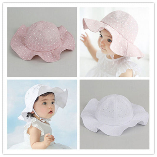 Adjustable Summer Sun Hat for Baby Girls with a wide brim and chin strap, providing stylish and protective beachwear for toddlers outdoors. | Everything Amazing Shop