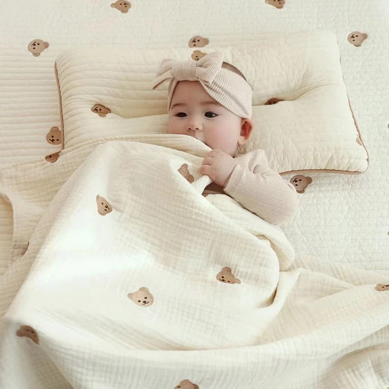 Korean Bear Embroidery Baby Sleeping Blanket made from soft cotton, perfect for newborns and toddlers. This unisex summer blanket provides comfort and style with adorable bear embroidery. Ideal for keeping little ones cozy during warm weather. Everything Amazing shop for this product.