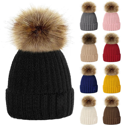 Stylish Winter Pompom Beanie Hat featuring a cozy knitted design and soft fur, perfect for women, baby girls, and boys. Stay warm and fashionable this season with this adorable, high-quality winter cap. Ideal for cold weather protection, it's the perfect addition to any winter wardrobe. Everything Amazing Shop for this product.